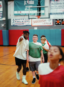 Nate pointing with camper