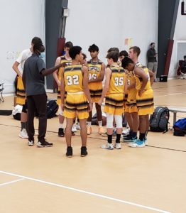 B10th gold with coach Jordan